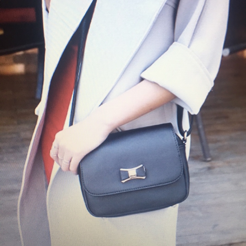 Mini black cross body bag with bow